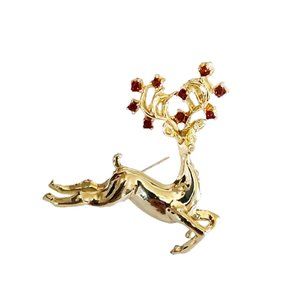 1960s Vintage Bright Gold Leaping Reindeer Pin With Red Jewels Holiday Brooch